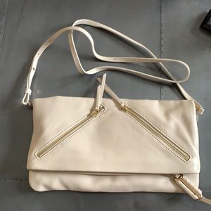Cream cross body bag.